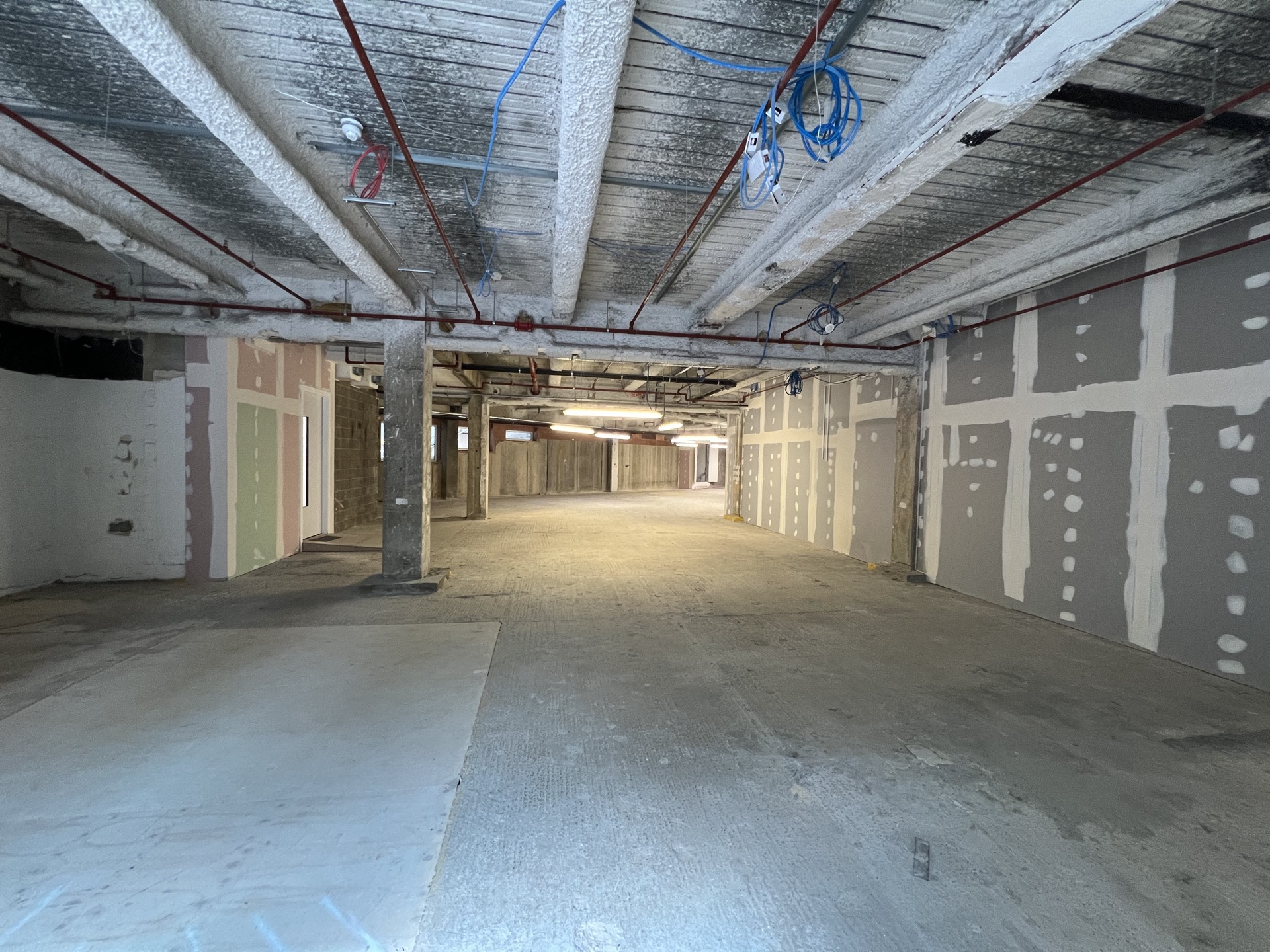 reception column line — concrete made-good, painted white — Existing
