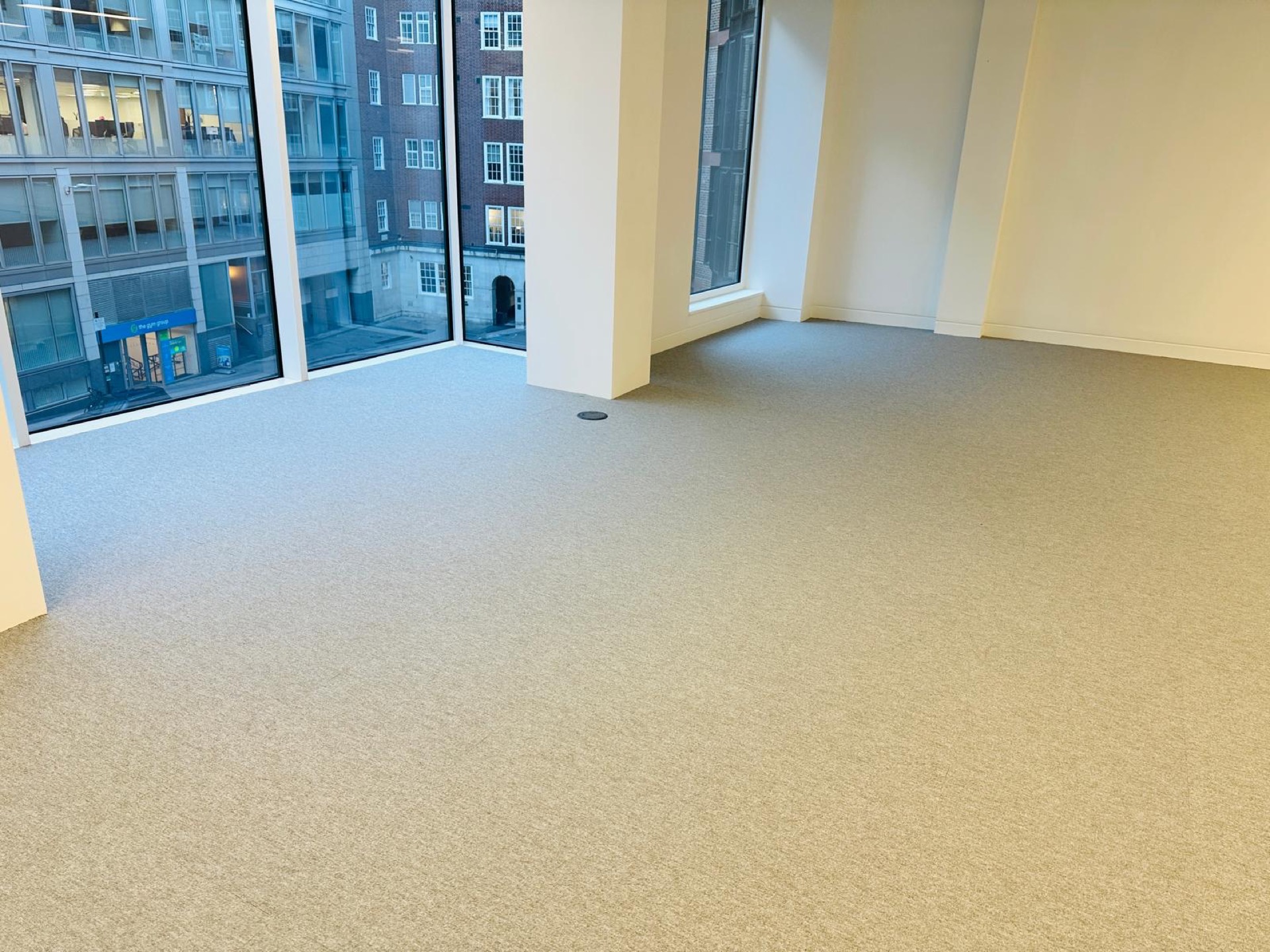 east open-plan — CAT B partitions stripped to slab, CAT A reinstated — Reinstated CAT A