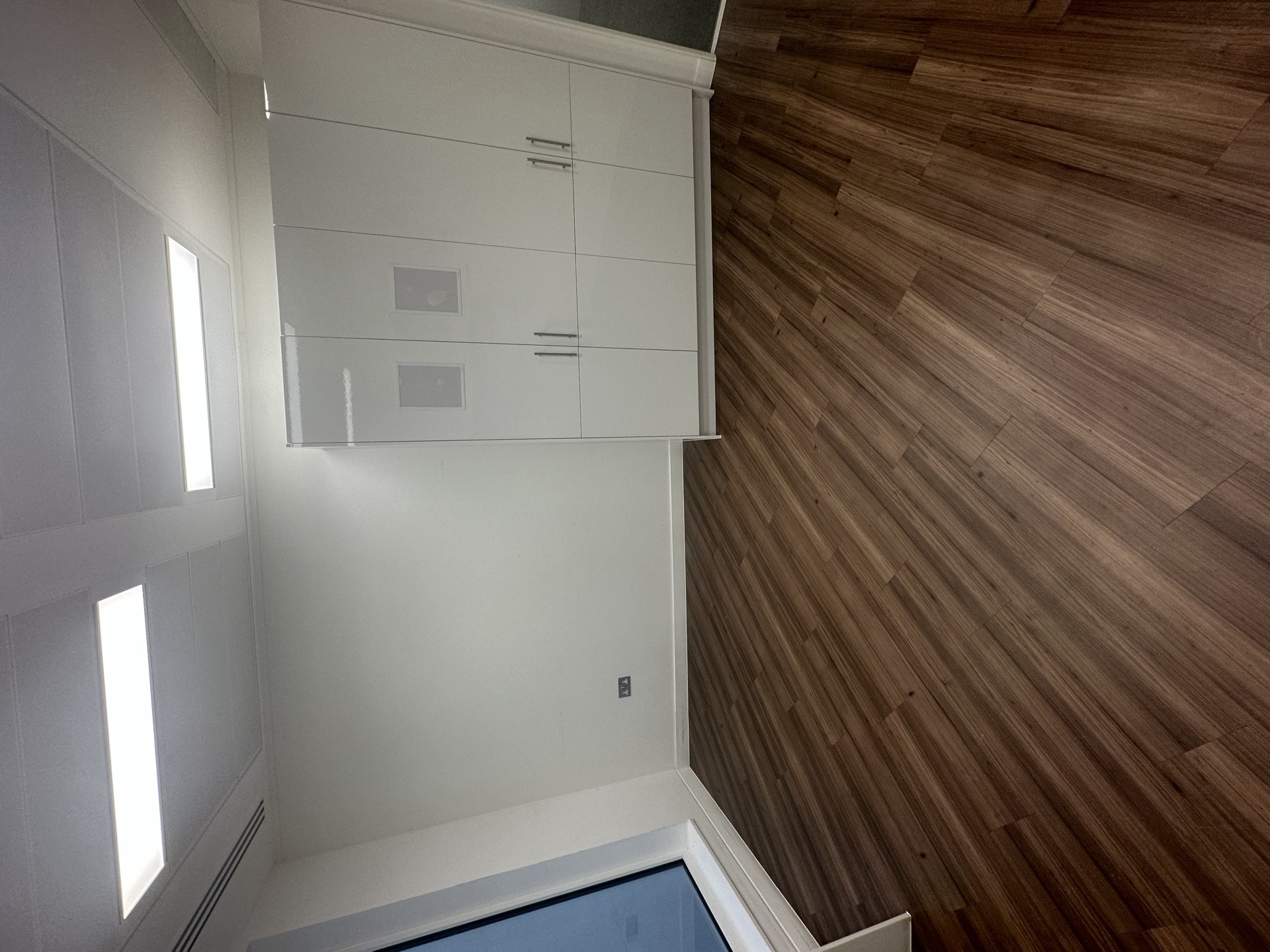 east open-plan — CAT B partitions stripped to slab, CAT A reinstated — Existing CAT B