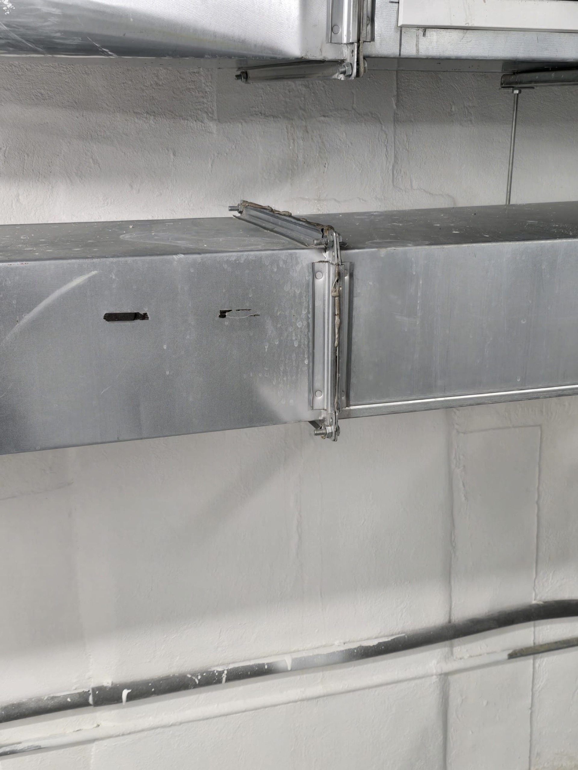 service riser cluster — exposed slab to clean white — Completed