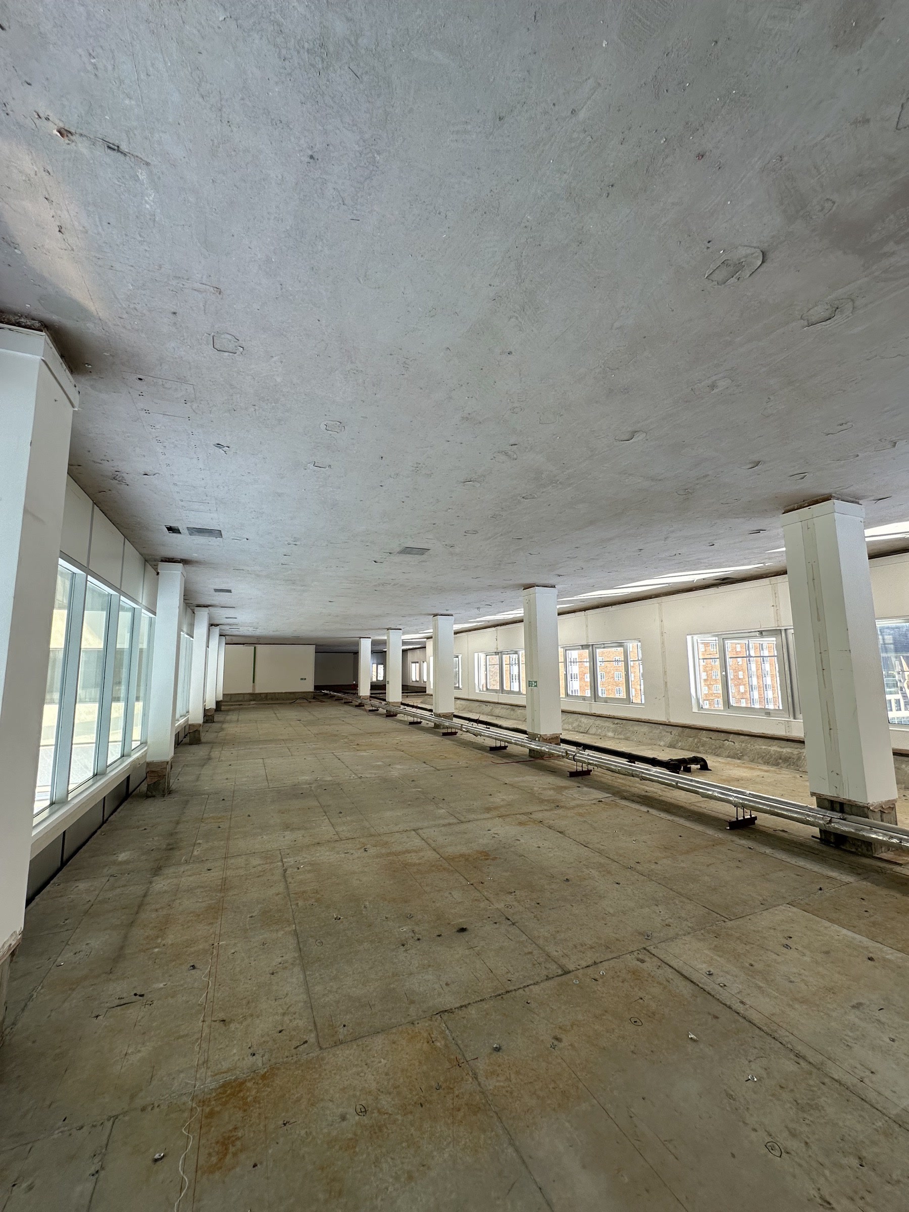 Atrium walkway — glass balustrade corridor — After